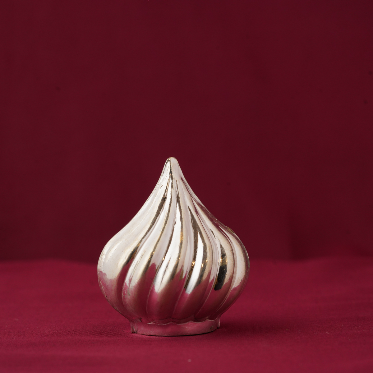 Silver modak